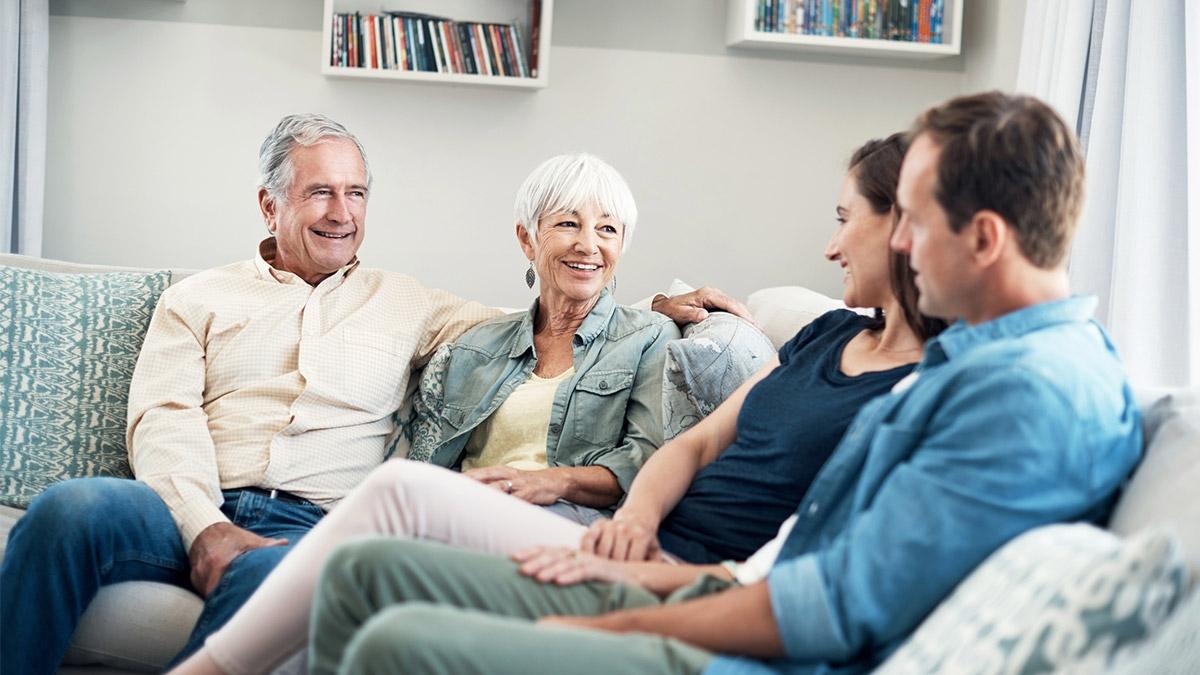 Adult children and senior parents speaking