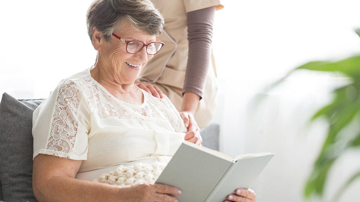 Older woman reading book