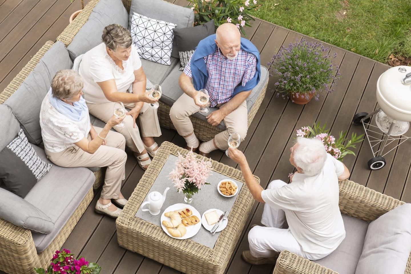 Seniors having meal outdoors