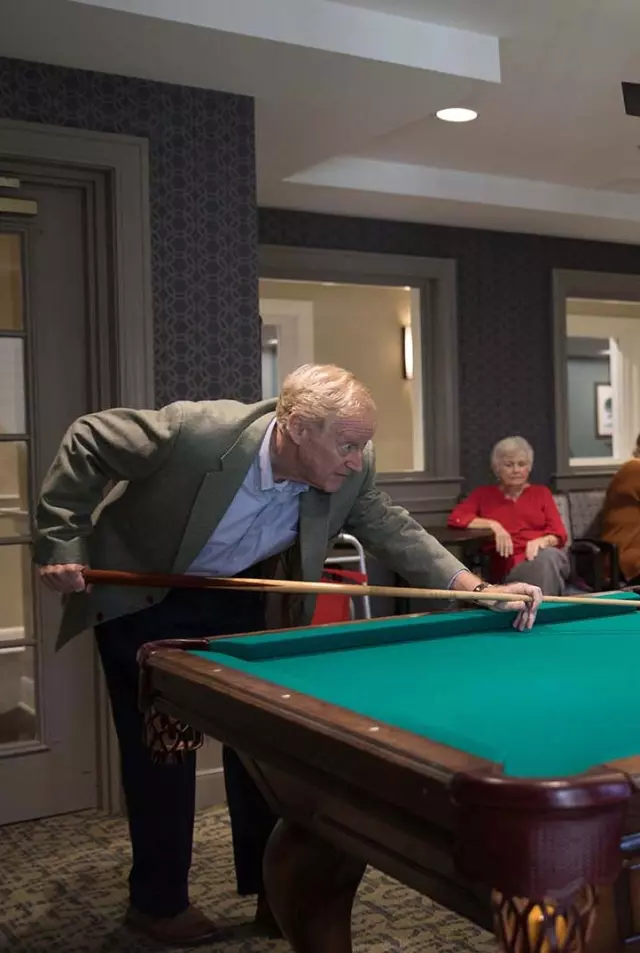 Seniors playing billiards